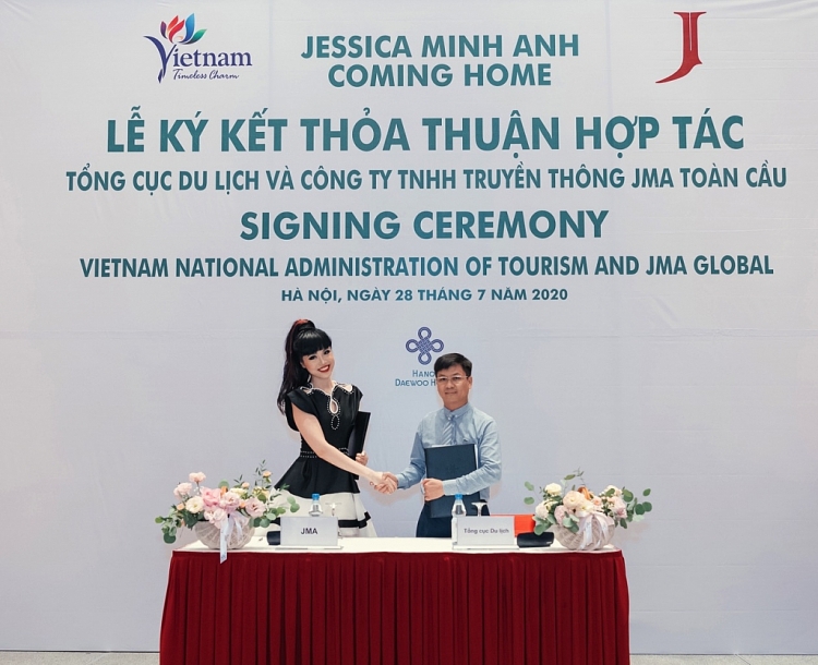 tong cuc du lich va sieu mau quoc te jessica minh anh ky ket thoa thuan hop tac ve quang ba xuc tien du lich viet nam